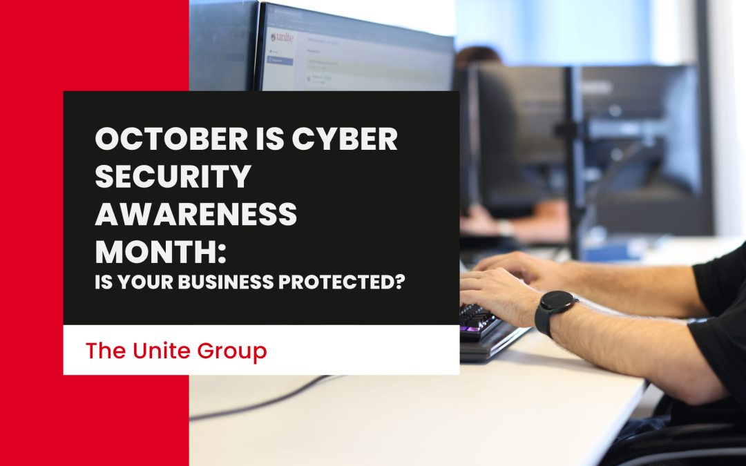 A the unite group employee working at a desk on a computer. text reads: October Is Cyber Security Awareness Month: Is Your Business Protected?