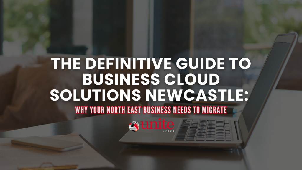 A laptop, phone and notebook on a table