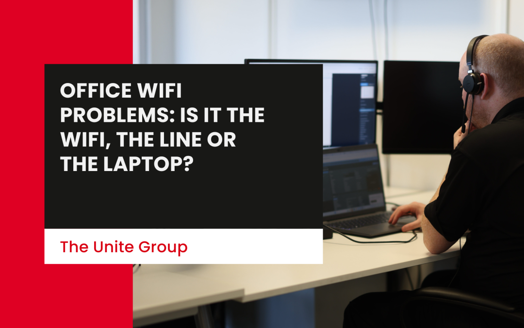 A Unite Group employee sat at a desk with headphones on working on a computer - Office WiFi problems: is it the WiFi, the line or the laptop?