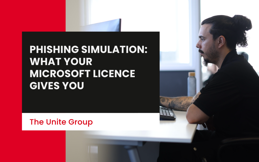 A Unite Group employee sat at a desk working on a computer-Phishing simulation: what your Microsoft licence gives you
